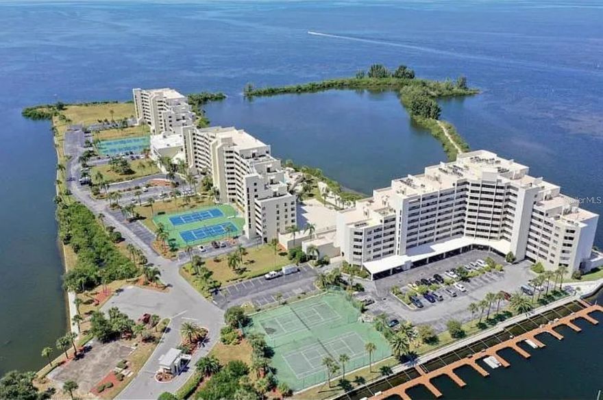 Are you ready to enjoy the Florida lifestyle? Ready to swim or kayak alongside dolphins or manatees? This turnkey 1 bed / 1 bath waterfront condo at Gulf Island Beach & Tennis Club serves up postcard views—Gulf waters to the horizon—and easy, coastal living. Light and breezy inside, it’s beautifully furnished and sold fully equipped (kitchenware, linens—just bring a suitcase). A generous living area opens to a walk-out patio/balcony so you can sip your favorite beverage and watch the sky glow at sunset. Storage-smart kitchen with ample cabinetry keeps everything tidy.

The community is guard-gated 24/7 with weekday on-site management and a long list of amenities: heated pool, tennis & pickleball, beach area, fishing, nature trail, fitness rooms with men’s & women’s lockers, aerobics room, plus a grand lobby & game room (tables, piano, dance floor) and an active social calendar. Marina nearby; dock restoration underway. Convenient access from the parking lot or garage makes coming and going easy, and you’re minutes from restaurants, parks, and Tampa Bay attractions. (HOA fee may include Internet & Cable—buyer to verify inclusions.) Come see why this community feels like its own slice of Florida paradise.