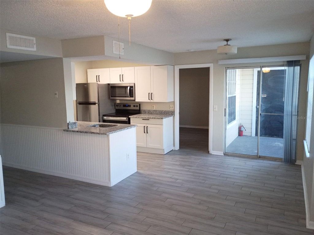 Photo of 1037 S Hiawassee Road #2818, Orlando, FL 32835 (MLS # O6388612)