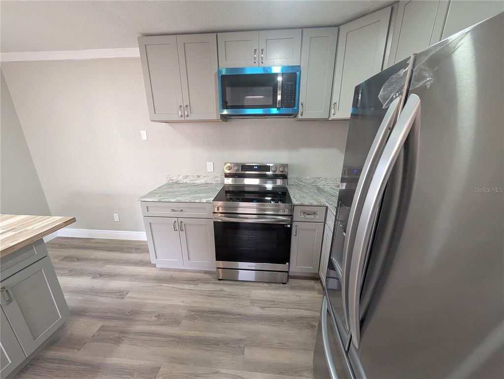 Photo of 5521 Bay Boulevard #201, Port Richey, FL 34668 (MLS # O6386941)