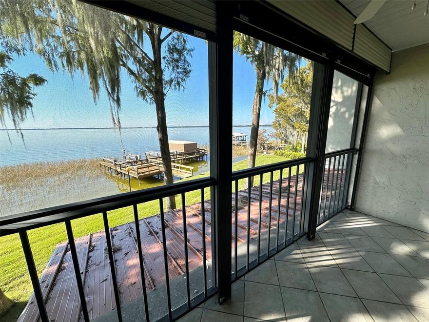 Welcome to the Kings Pointe Condos, where tranquil lakefront living meets a quaint community atmosphere. Nestled along the shores of Lake Eustis on the chain of lakes, this unique condo offers a rare opportunity to own a slice of paradise in a small, intimate complex with only 8 units. You can enjoy breathtaking sunsets and gentle lake breezes right from your own private balcony. Unit No. 5 offers unobstructed views of Lake Eustis, creating a sense of tranquility and relaxation. Kings Pointe is conveniently situated within proximity to various amenities, including downtown Eustis, Ferran Park, Sunset Island, the Waterfront Grille and Marina, and easy access to major roadways, making commuting a breeze. This condo has been a successful rental property, making it an excellent investment opportunity. For those looking to generate passive income, this condo's rental history and demand for lakefront properties make it a highly appealing option. While this condo boasts a prime location and stunning views, it presents an exciting chance for the buyer to put their personal touch on the interior. If you have a vision for modern upgrades, this condo can be transformed into your dream lakefront retreat. Don't miss this opportunity to own a piece of the sought-after Lake Eustis lifestyle. Whether you are seeking an investment property or a serene lakefront retreat, this condo at Kings Pointe Condos is a must-see. Contact me today to schedule a private tour and explore the endless possibilities this charming unit has to offer. The listing agent has partial ownership of the property. One or more photos have been virtually staged.  Property cannot be rented on a short term basis.  Minimum 6 month rental.