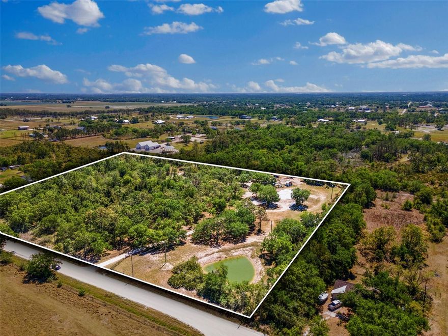 A very Unique opportunity to acquire over 8 acres of improved land with excellent road frontage minutes from Lakewood Ranch. The property already has a well, septic and electric connected. Includes full water filtration and softening system. The site has a chicken coop, 2 outbuildings and an RV. There is an active permit for a 2 story home and the slab is poured for the foundation. Materials to build the home are available to purchase separately. This 8.18 acre lot is perfect for those looking for land to keep chickens, goats etc while being 2 mins to Lakewood Ranch. It is very difficult to find residential lots of this size in this zip code. The property includes an oversized well and septic already in situ with a full culligan water treatment system. The property also includes a number of outbuildings including a chicken coup and a garage. The seller has had to pause construction due to a change in circumstances. Zoned for agricultural use, the property allows for the keeping of chickens, goats, and other animals, offering an excellent opportunity for those seeking a rural lifestyle. This unique property provides the framework for a custom home in a highly sought-after area, with the potential for agricultural or hobby farm use.