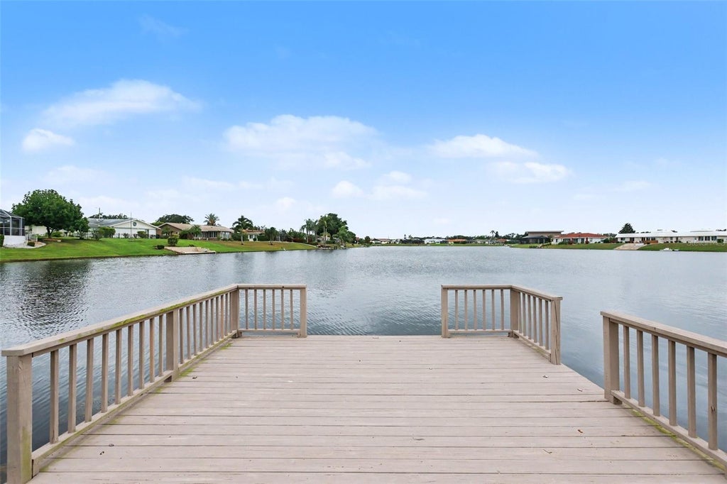 Photo of 403 S Pebble Beach Boulevard, Sun City Center, FL 33573 (MLS # TB8555218)