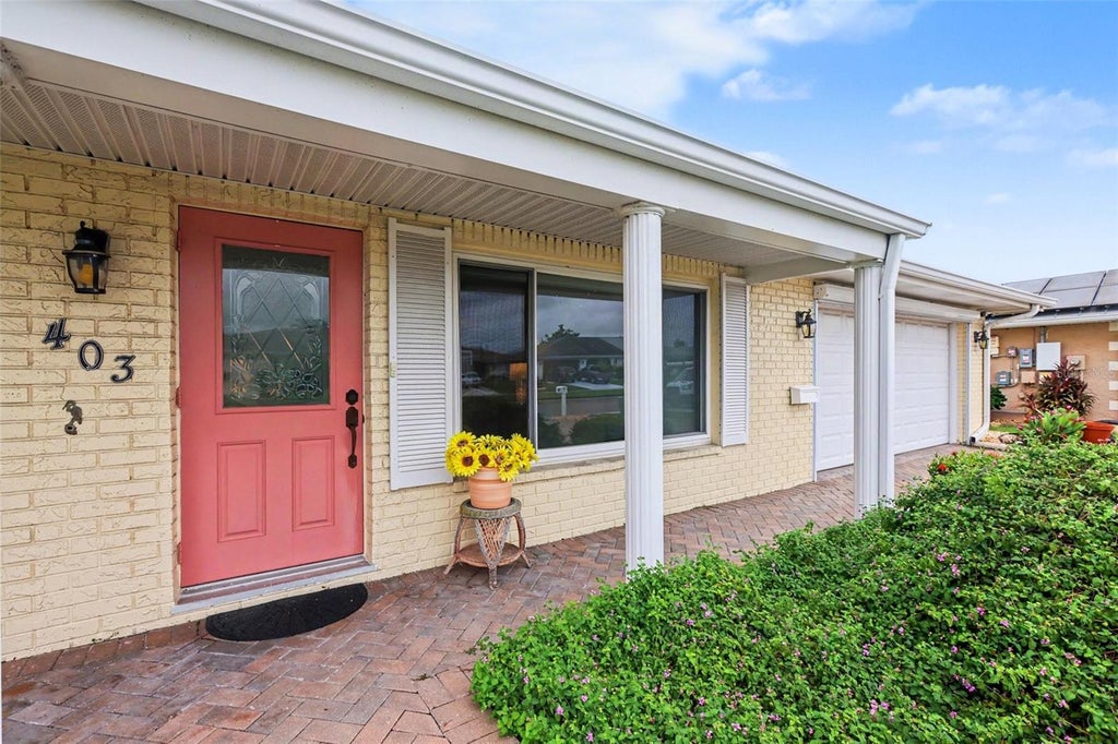Photo of 403 S Pebble Beach Boulevard, Sun City Center, FL 33573 (MLS # TB8555218)