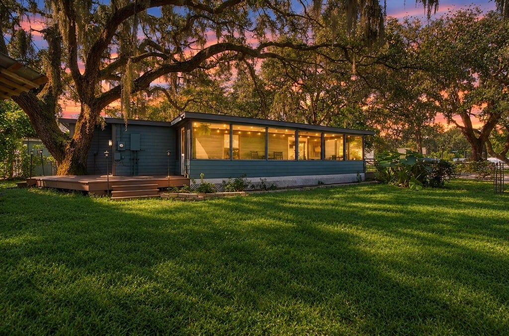 Photo of 1922 Beachway Lane, Odessa, FL 33556 (MLS # W7890367)