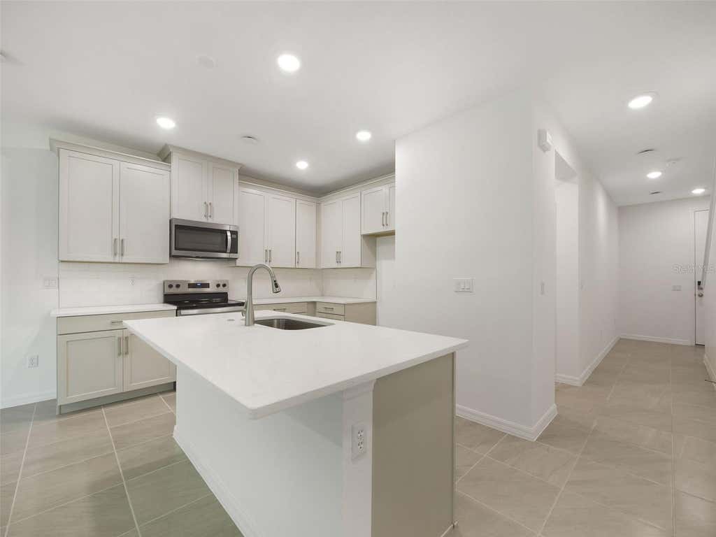 Photo of 1649 Greenleaf Wood Cove, Oviedo, FL 32765 (MLS # O6423733)