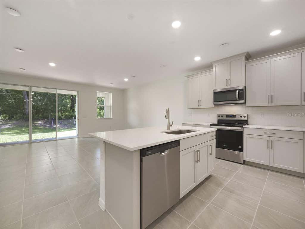 Photo of 1649 Greenleaf Wood Cove, Oviedo, FL 32765 (MLS # O6423733)