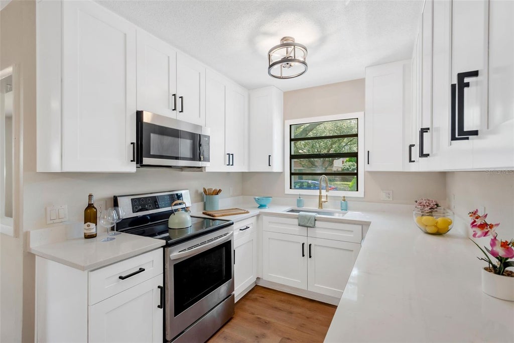 Photo of 15065 Newport Road, Clearwater, FL 33764 (MLS # TB8537674)