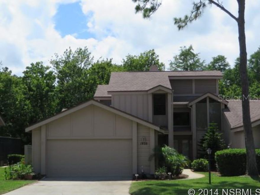 Located in the Woodside neighborhood of the prestigious Spruce Creek Fly-In, a gated country club community, this 3 bedroom, 2.5 bath villa features a beautifully renovated kitchen with Schrock Cabinetry and Silestone countertops with integral sink. Walls have been removed to create a spacious, open living area with 18" tile, wood burning corner fireplace, that can be enjoyed from both the dining room & living room. French doors with built in blinds were added to the casual dining area and open to the screened & covered lanai that overlooks the peaceful nature area. The formal dining area can be easily accessed from the kitchen through the new arched door way. A new 3 ton Lenox A/C was installed June 2014. Oversized 2 car garage has epoxy floors & storage cabinets. The front of the unit is just across from the Woodside Gazebo & Park like setting that leads to the newly updated Community Pool. Monthly HOA fee for Woodside is $390 & covers the exterior maintenance that includes the pool, lawn, termite bond, painting & roof replacement. The Spruce Creek POA fee is $1,350 a year & covers 24 hour security, maintenance on all common areas such as the children's playground, the 4000' runway, taxiways, overlook park & all roads. ;LocationDescription: Condo ;Water: City