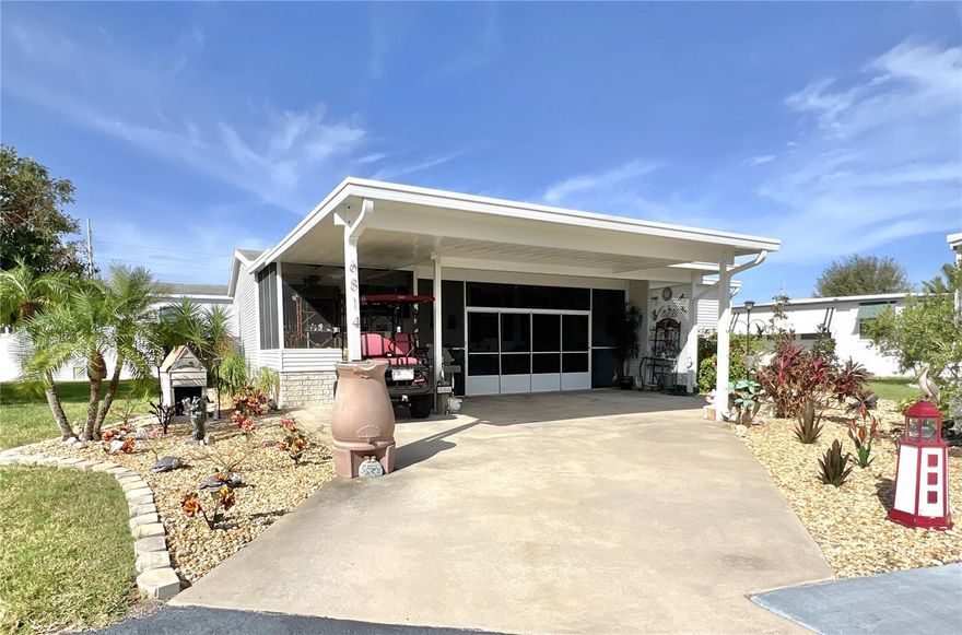 Step into a tropical oasis with this 2 bed/2 bath 2008 manufactured home located in popular Americana Cove, a 55+ waterfront community with saltwater canals to Tampa Bay. The home boasts a large screened 2-level lanai--a great place to entertain friends and family or to have a quiet retreat. This move-in ready home has many upgrades: composition shingle roof, 2016 vapor barrier to protect the subflooring, 2015 plumbing, 2024 HVAC system, water heater maintained through Duke Energy's maintenance program, and 2023 washer/dryer located inside of the home. Open kitchen/dining/living area that overlooks the lanai. The kitchen features plenty of cabinets for storage and newer appliances including dishwasher. Large primary bedroom with ensuite. Comfortable guest bed and bath. Large shed with shelving. Home has long driveway for parking and sits back off road for privacy. Look what is included in the price: Comes mostly furnished with beautiful coastal style furniture, newer golf cart with 2025 sound system and share for the lot and ownership in the co-op. Two dogs or cats up to 35 pounds are welcomed. Low monthly maintenance fee of $380 includes water/sewer, trash pick up, lawn mowing, 24 hr gate, private streets, seawall maintenance and all amenities including fitness, clubhouse, heated pool and so much more! Best of all--No damage or flooding from 2024 storms! The community is located only 10 mins from downtown St. Petersburg, 15 mins to two airports and 3 mins to 4th Street shopping, many restaurants and grocery. Management requires 675+ credit score. This beautiful home is a star!