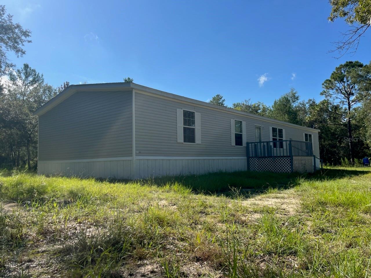 SOLD BEFORE IT HIT THE MARKET! PRICED TO SELL! Where else can you find 5 bedrooms and 3 bathrooms on just under 5 ACRES, with over 2,000 square feet and UNDER $400,000!? This one is an absolute dream! Welcome to 11360 Salina Street, where you have PLENTY of land for your animals and toys, and close enough to shops and dining where it’s convenient, but not too close to the city! Enjoy being tucked away with your gated entry, and with your home being far enough from the street you’ll have plenty of privacy! As you pull into your property, you’re greeted by immaculate curb appeal and BRAND NEW (July 2025) SKIRTING! Not to mention the convenience of a ramp leading to your freshly painted porch! Take a step inside, where your BRAND NEW (July 2025) flooring welcomes you and is laid neatly around your home! Your living and dining areas are both a very generous size to accomodate and host guests and family gatherings! Your 5 bedrooms are all generously sized, and give you so many options for guests, an office, a media room, and so much more! Your kitchen opens up to the rest of the home with ease, and stepping towards the back door you’ll head into the backyard, walk down your freshly painted steps into your HUGE yard, fully equipped with two large sheds boasting plenty of storage space and room for just about anything you can think of! Being in a great location with so many opportunities, this home is priced great and ready for new owners, call today to make it yours!