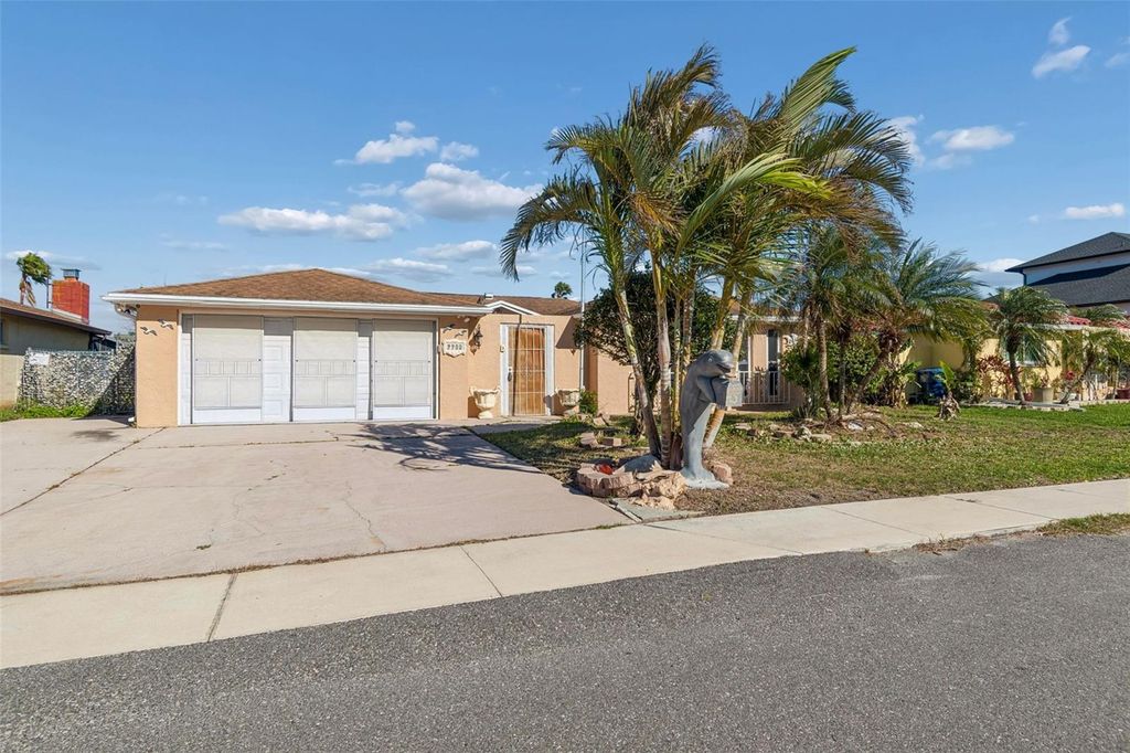 Photo of 9900 Island Harbor Drive, Port Richey, FL 34668 (MLS # TB8487509)