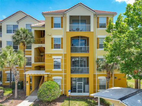 Photo of 3338 Robert Trent Jones Drive #307, Orlando, FL 32835 (MLS # O6406446)