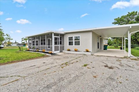 Photo of 198 Cypress Avenue NW, Port Charlotte, FL 33952 (MLS # TB8408039)