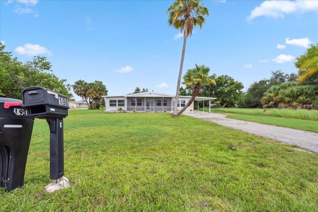 Photo of 198 Cypress Avenue NW, Port Charlotte, FL 33952 (MLS # TB8408039)