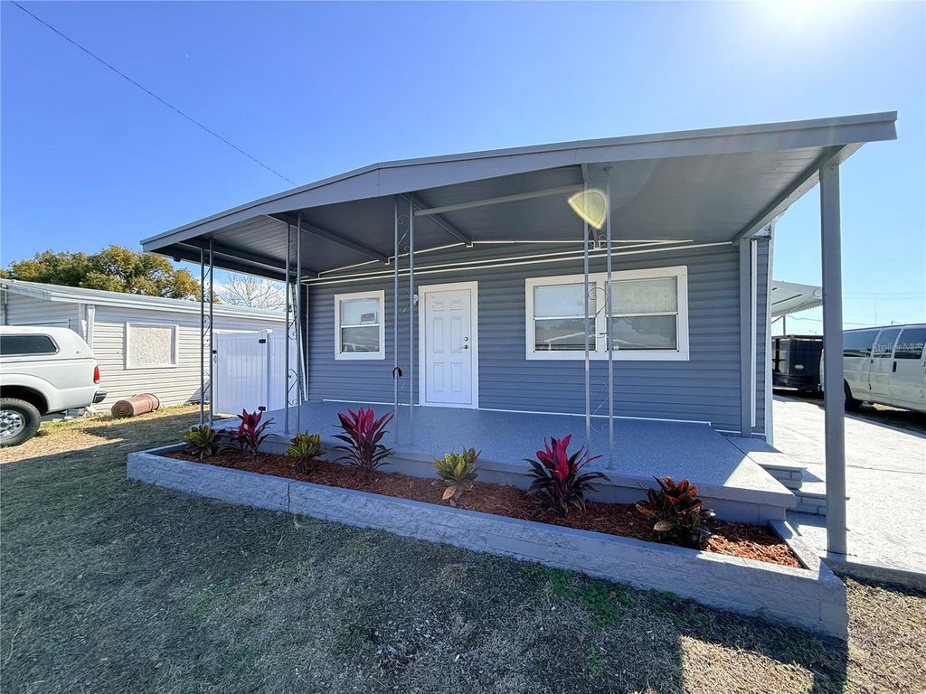 Photo of 4004 Reggie Drive, Holiday, FL 34691 (MLS # TB8468550)