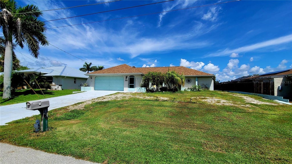 Photo of 18710 Van Nuys Circle, Port Charlotte, FL 33948 (MLS # TB8547780)