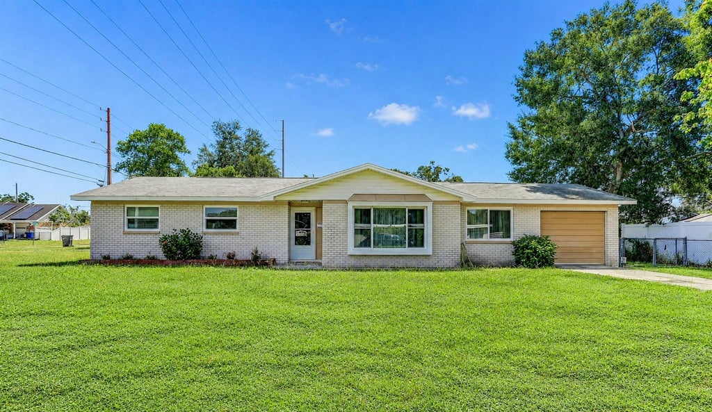 Photo of 7703 Lakeside Boulevard, Tampa, FL 33614 (MLS # TB8543949)