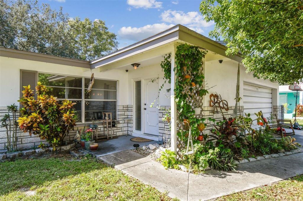 Photo of 1444 Cottonwood Terrace, Dunedin, FL 34698 (MLS # TB8430330)