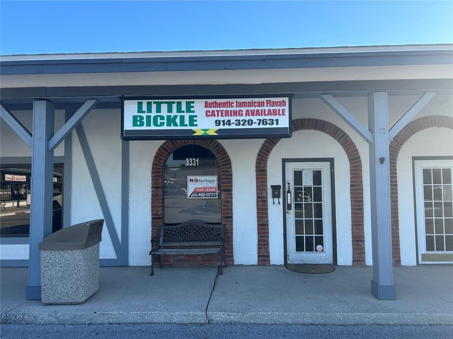 A former food serving retail unit with 3 station steam table, 3 4-top tables, hand wash sink, 3 basin sink w/undercounter grease trap, wash tub and other features suitable for non-cooking establishment like a smoothie shop.  1 bathroom in rear corner.   One pylon sign space available for this unit.  640sf x $19/sf/yr = 1,013.33/mo