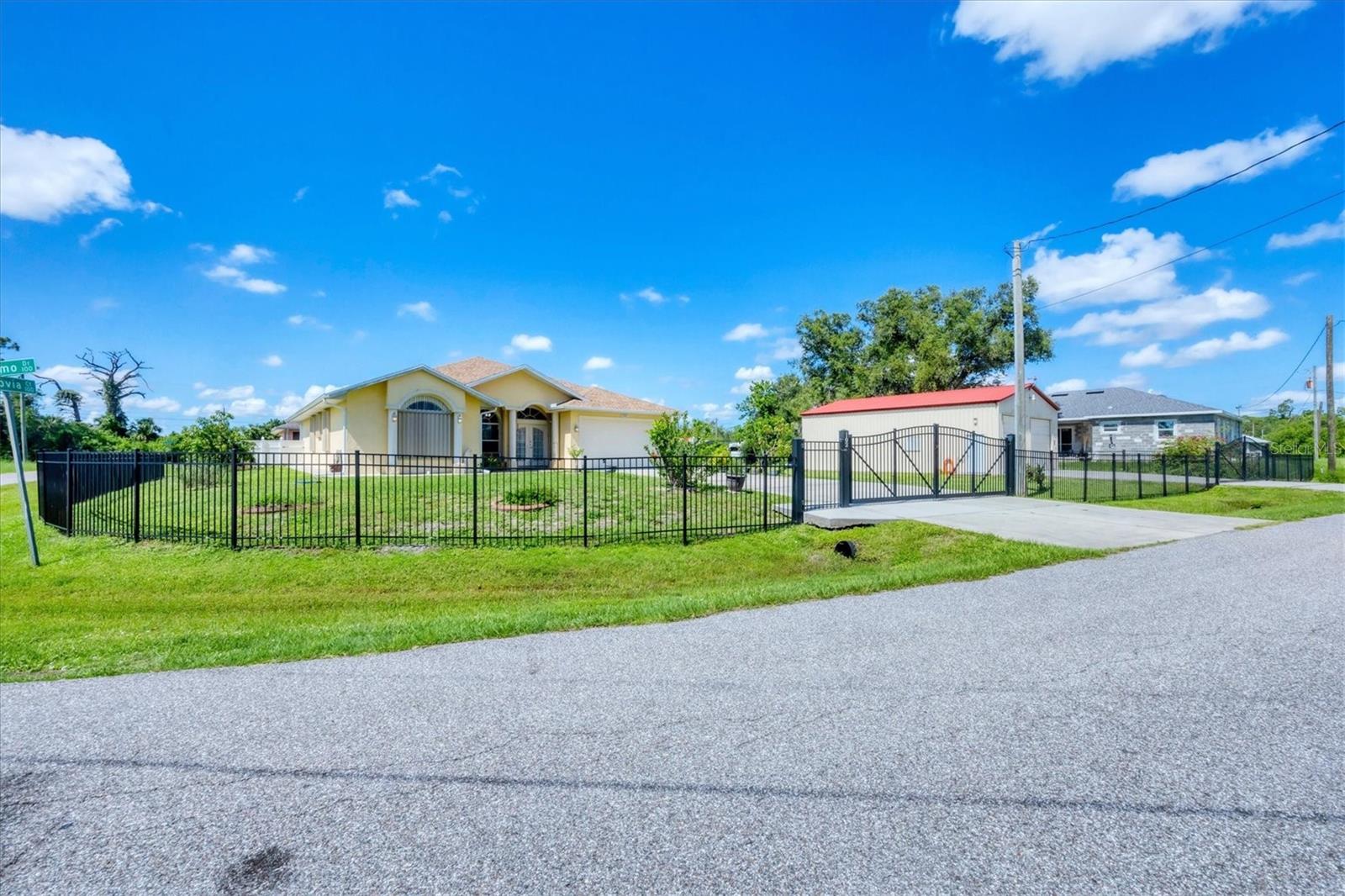 Located in Warm Mineral Springs, this updated home is move in ready, located on a double lot this home boasts four large bedrooms, three beautifully updated bathrooms, an updated kitchen with granite counter tops, ceramic tile flooring throughout. Attached two car garage, and on other 1/2 of the lot there is an extra two car garage that can be used to house your boat, or RV.