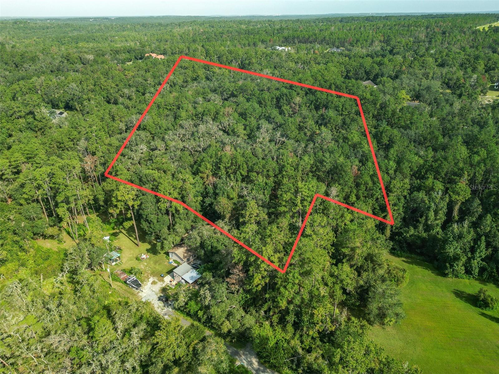 7 Acres of Tranquil Florida Beauty – Zoned AG. Discover the perfect blend of privacy and natural beauty on this stunning 7-acre parcel, zoned AG. Towering native Florida hardwood trees provide a serene backdrop, while a seasonal creek meanders through the property, attracting abundant wildlife and creating a true nature-lover’s retreat.This land offers the ideal opportunity to design and build your dream home in a peaceful rural setting, with plenty of space to spread out. Despite the secluded feel, you’ll enjoy convenient access to Brookesville and the Veterans Expressway, keeping you connected to modern conveniences while maintaining your quiet escape.
Opportunities like this are rare – don’t miss your chance to own a size-able piece of Florida’s natural landscape and create the lifestyle you’ve always imagined.