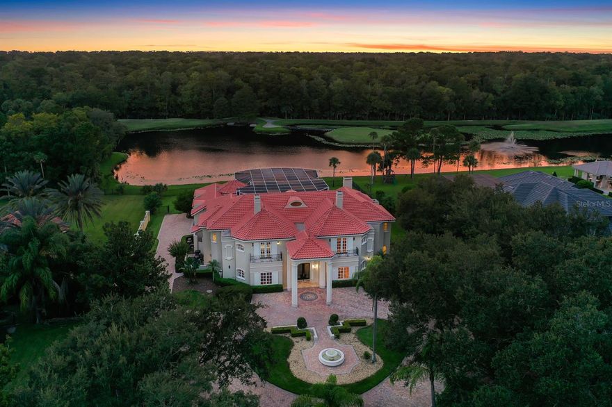 Charles Clayton Masterpiece nestled on a 1.2-acre homesite in 24-hour guard-gated Alaqua showcasing incredible water, golf, and preserve views.  Distress sale needing TLC and a buyer with a vision.  This property may be under audio/visual surveillance.