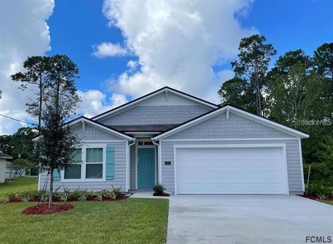Photo of 7 Reybell Ln, Palm Coast, FL 32164 (MLS # FC316747)