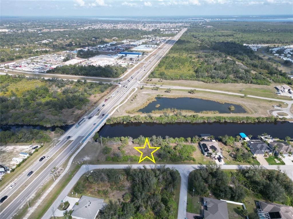 Photo of 13914 Orbit Avenue, Port Charlotte, FL 33981 (MLS # D6140568)