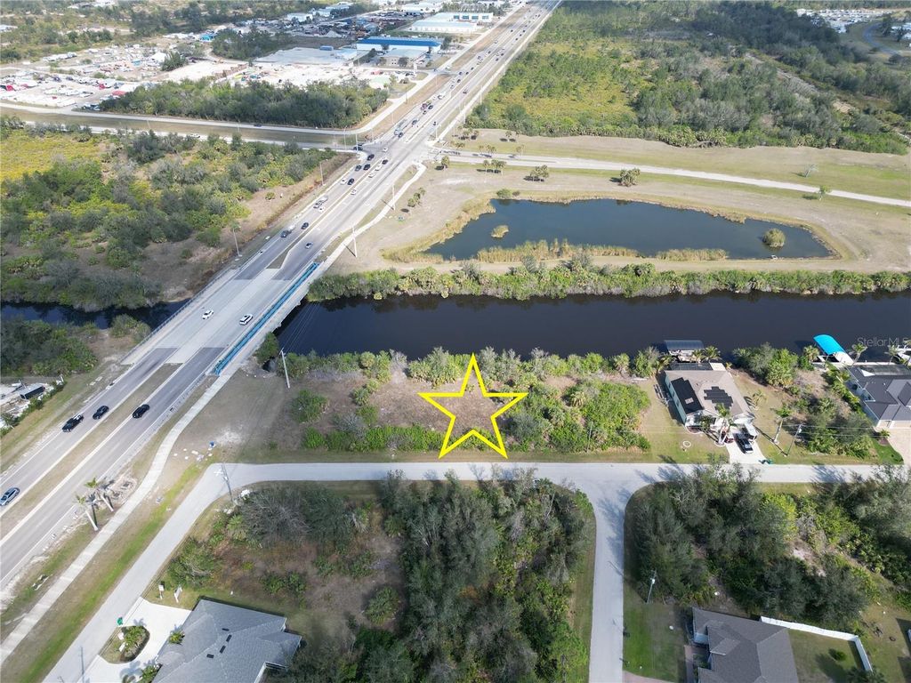 Photo of 13914 Orbit Avenue, Port Charlotte, FL 33981 (MLS # D6140568)