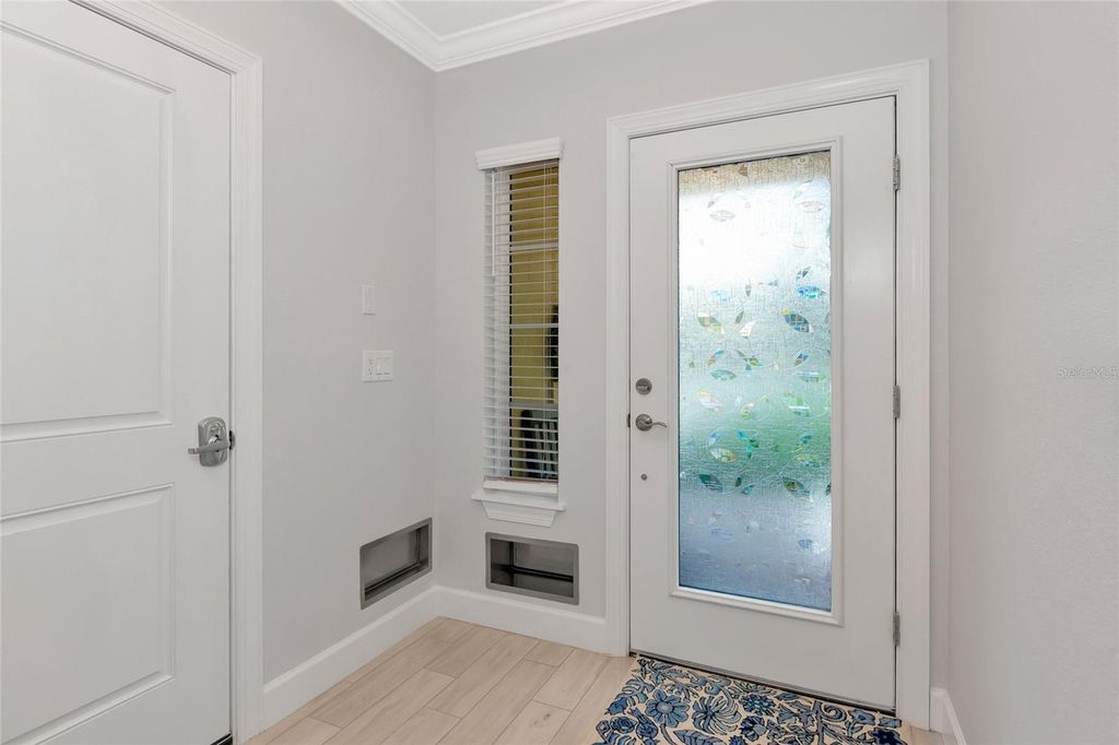 Photo of 5561 Cannes Circle, Sarasota, FL 34231 (MLS # A4652063)