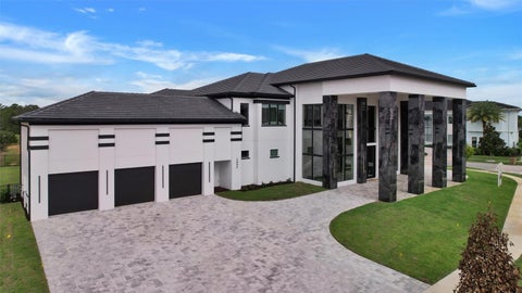 Photo of 1002 Coyote Creek Way, Reunion, FL 34747 (MLS # S5156984)