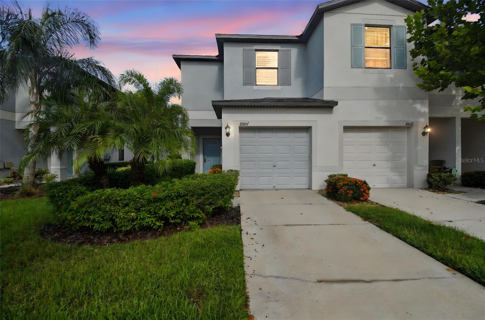 Motivated Seller – Bring an Offer!
Welcome to this beautifully maintained end-unit townhome in Tampa’s sought-after Touchstone community. Built in 2018, this 2-bedroom, 2.5-bath home combines style, convenience, and low-maintenance living. Situated along open green space, this home offers a bright, airy feel and plenty of guest parking nearby.
Main Level: Step inside to an open-concept living and dining area adorned with elegant custom wood shutters and filled with natural light. The kitchen offers rich dark cabinetry, ample counter space, a breakfast bar, and a dining nook with double windows overlooking peaceful green space. Sliding glass doors lead to the screened lanai—perfect for morning coffee or relaxing evenings. A convenient powder bath and one-car garage complete the first floor.
Upstairs Retreat: The spacious primary suite includes a walk-in closet and an ensuite bathroom with dual sinks and shower with glass doors. The second bedroom also has its own ensuite bath and walk-in closet—ideal for guests or a roommate setup. A laundry room is conveniently located between the bedrooms. Custom wood shutters compliment the upstairs windows as well.
Community & Location:
The HOA covers lawn care and provides access to a resort-style pool, fitness center, clubhouse, splash pad, and playground. With easy access to I-75, I-4, Downtown Tampa, Brandon Town Center, sports venues, medical facilities, and Gulf Coast beaches, the location is unbeatable.
This move-in-ready home is priced to sell, and the seller is motivated. Schedule your showing today and make this beautiful townhome yours!