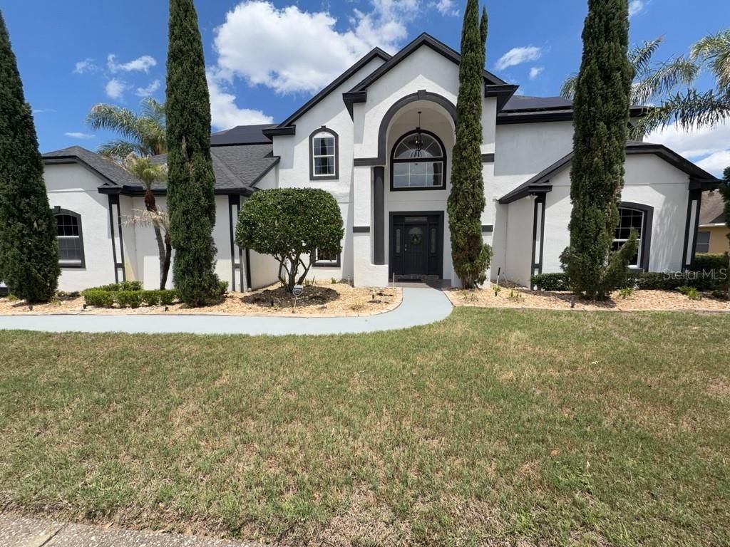 Photo of 8131 Vineland Oaks Boulevard, Orlando, FL 32835 (MLS # O6421040)