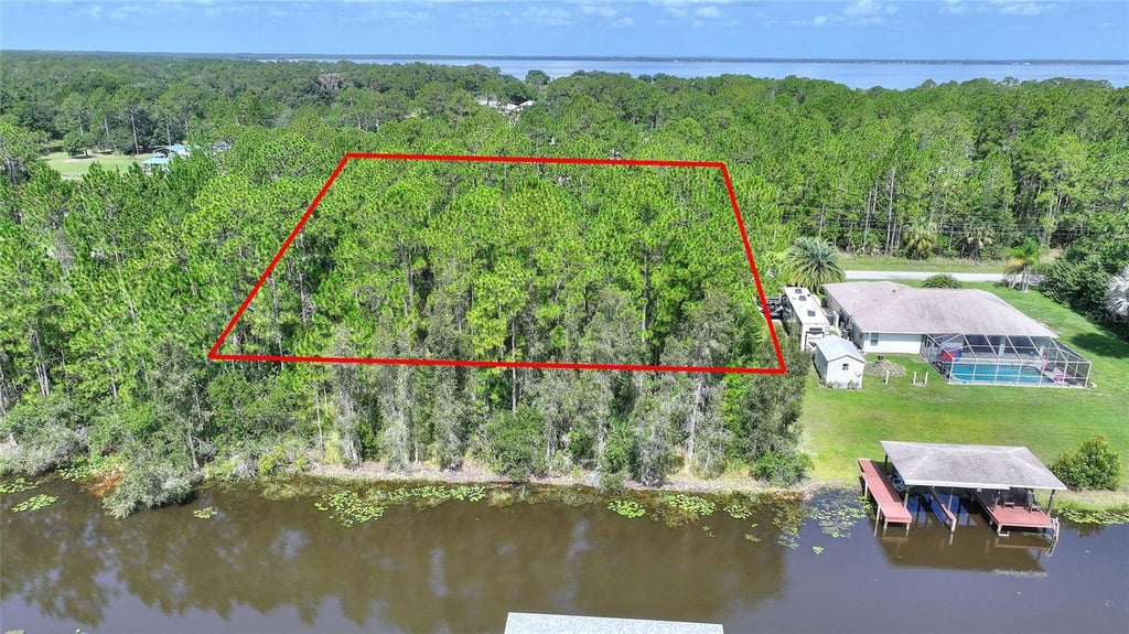 Photo of 28 Amaryllis Drive, Indian Lake Estates, FL 33855 (MLS # P4939577)