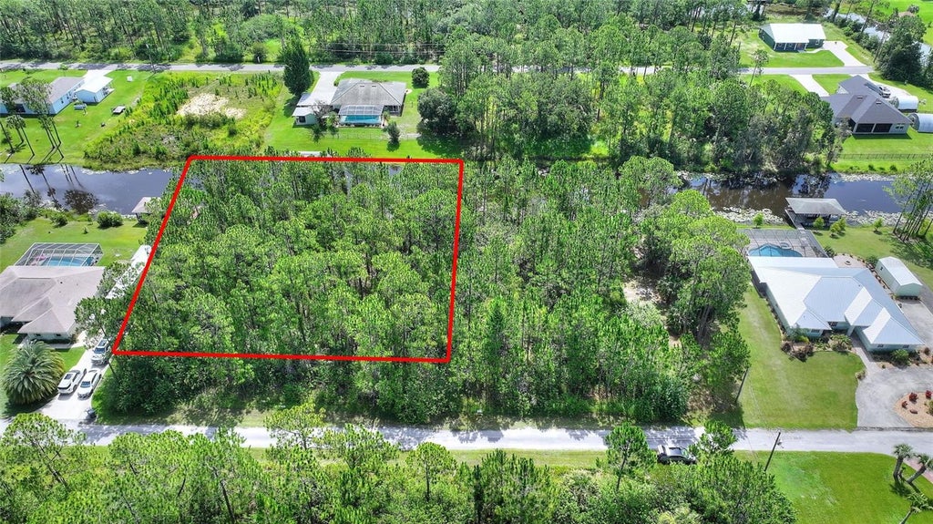 Photo of 28 Amaryllis Drive, Indian Lake Estates, FL 33855 (MLS # P4939577)