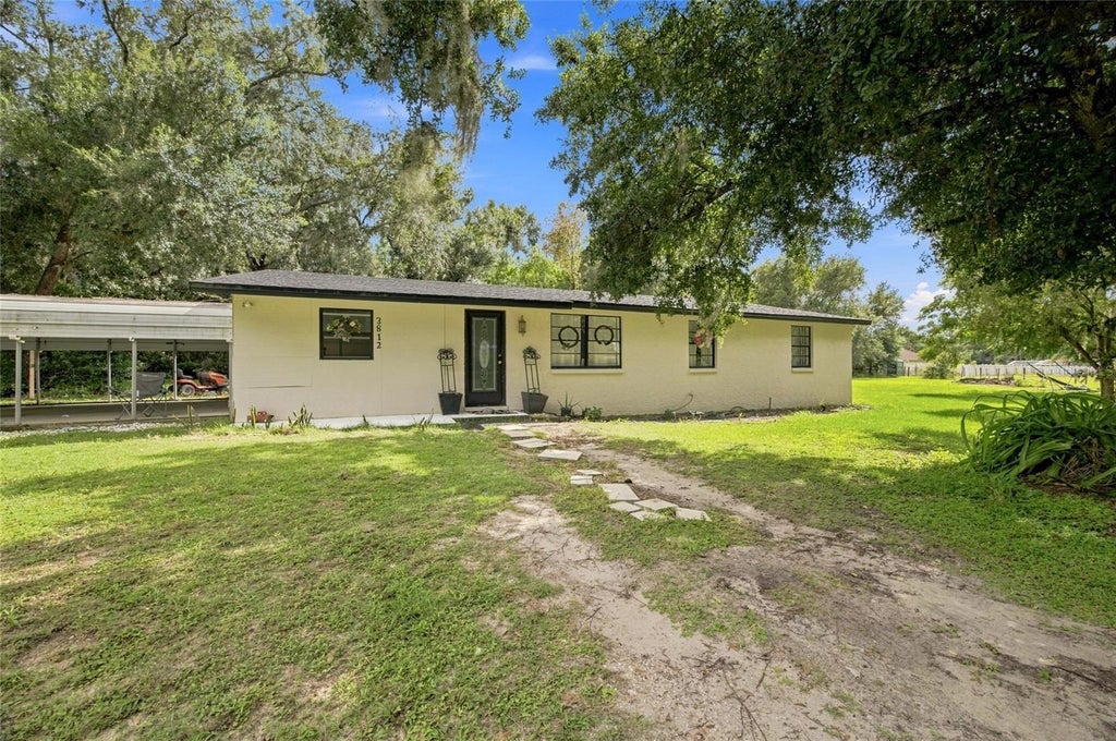 Photo of 3812 Reverend Dar Dar Drive, Plant City, FL 33565 (MLS # TB8539847)