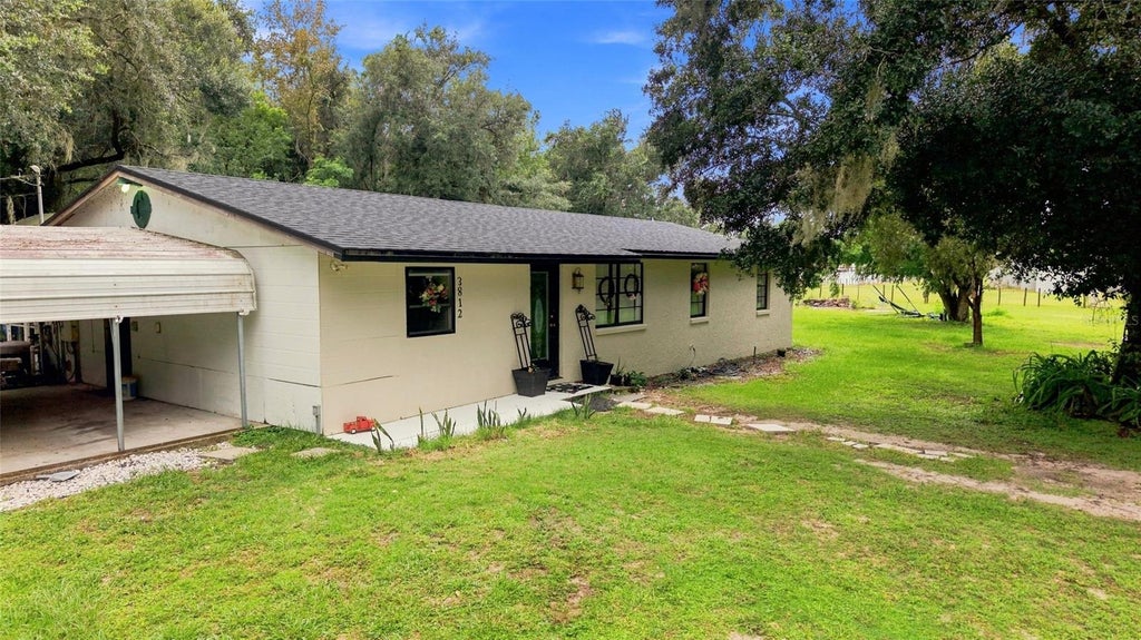 Photo of 3812 Reverend Dar Dar Drive, Plant City, FL 33565 (MLS # TB8539847)
