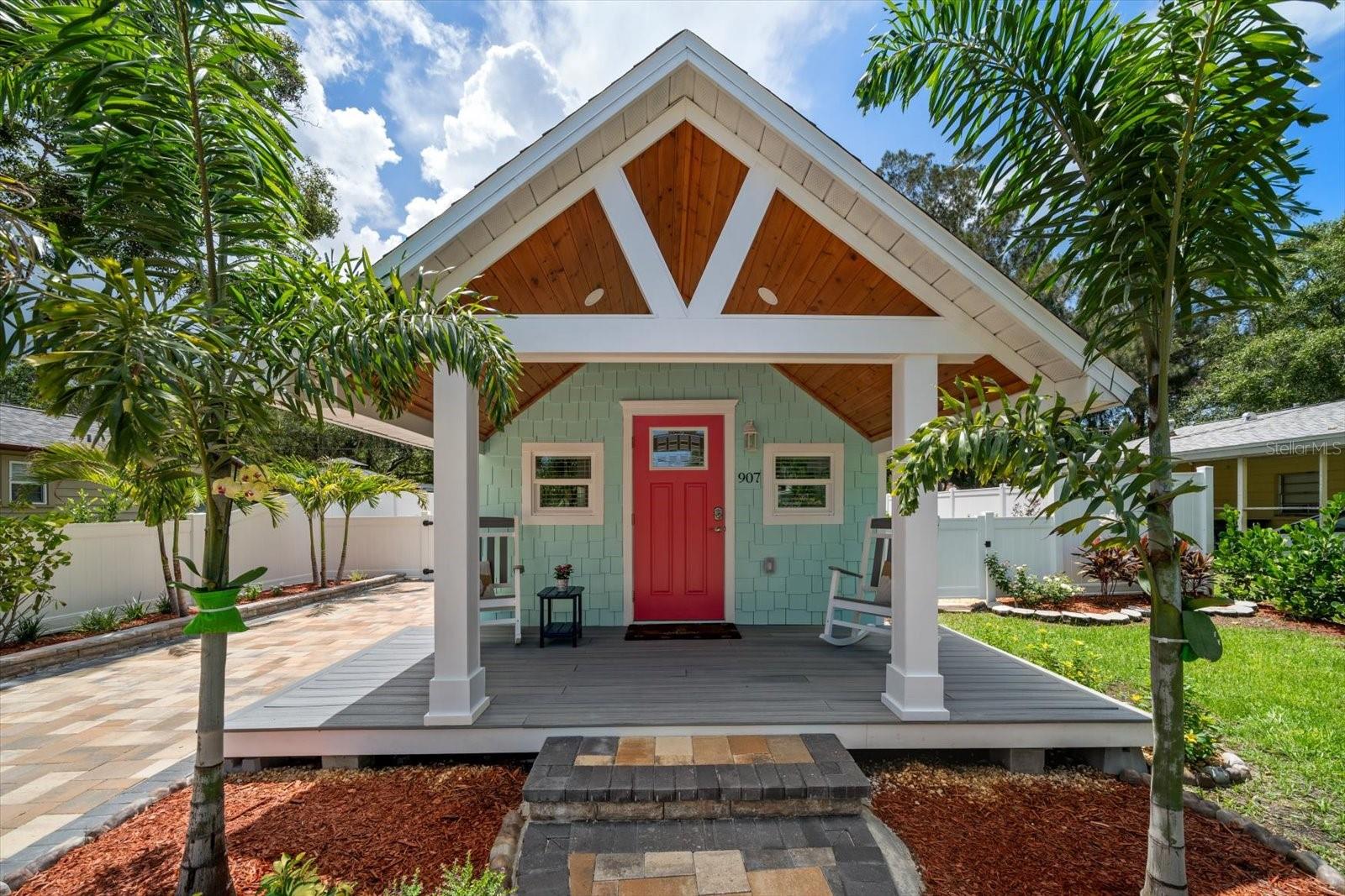 This completely renovated cottage radiates charm and style from the moment you arrive, with a fresh tropical landscape, pavered driveway, and inviting front porch creating undeniable curb appeal. Perfect for a first-time homebuyer or anyone looking to downsize in a prime location, this home has been thoughtfully designed with an amazing color palette and a seamless blend of comfort and sophistication. Inside, gorgeous tile flooring flows throughout the light-filled living spaces, setting the tone for the show-stopping dine-in kitchen featuring stainless steel appliances, quartz counters, a custom backsplash, and an apron-front sink. The family room is bathed in natural light, while the stunning bathroom impresses with a custom walk-in shower and a furniture-inspired vanity. The bedroom offers generous closet space and comfort, with barn doors cleverly concealing the laundry area. Outside, the expansive backyard provides multiple areas for entertaining or relaxing, making it a true extension of the living space. Ideally located near shopping, dining, two airports, and world-famous beaches, this home is a rare opportunity to own a beautifully renovated retreat in a highly desirable area.