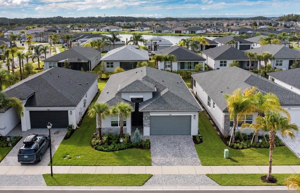 Photo of 3101 Malta Avenue, Wesley Chapel, FL 33543 (MLS # W7889267)