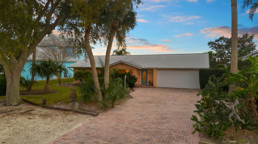 Live the Florida dream in this stunning 4-bedroom, 3-bath waterfront residence nestled in Inlet Shores, one of New Smyrna Beach’s most peaceful and private neighborhoods. Set on an impressive 75 x 260 deep-water lot, this property offers exceptional space, privacy, and a true coastal lifestyle.

Designed for both relaxation and entertaining, the backyard is a private oasis featuring a 20,000-gallon saltwater pool, covered patio, and private dock with boat lift. The canal provides direct access to the Intracoastal Waterway, making spontaneous boat days effortless. Evenings are truly unforgettable, with breathtaking sunset views from the dock that are nothing short of spectacular.

Inside, the home offers a bright, open floor plan with a spacious family room and a welcoming kitchen ideal for gatherings. Large sliding glass doors flood the interior with natural light and seamlessly connect indoor living to the waterfront outdoors. A hurricane-safe bonus room adds peace of mind and versatility, which is perfect as a secure retreat, office, or flex space.

This exceptional waterfront property combines location, lifestyle, and rare features into one remarkable offering.