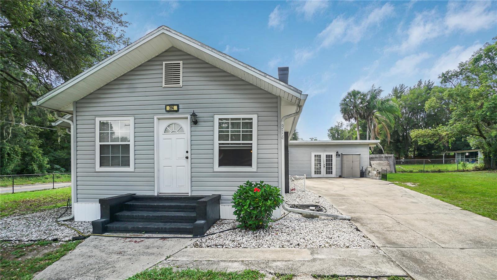 Beautiful 3 Bedroom/1 Bathroom Home On A Corner Lot. This Home Has An ENDLESS Amount Of Benefits And Features over 1,600 sqft With An Open Floor plan And Tons Of Natural Light In All Rooms. When You Enter The House, You Will Find A SPECTACULAR Layout Design With Details Such As A Spacious Living Room Combined With Dining Room Right Next To The Kitchen. Some Upgrades Include New AC, Insulated Glass Windows, Siding, Above Ground Pool (Liner Needs To Be Replaced), New Appliances, Fire Place, Hardwood Laminate Floors, Ceiling Fans, Wood Fencing, MAJOR Back Yard Space As Well As Storage/Shed/Screened In Patio, And Amazing Curb Appeal. Conveniently Located Just Steps Away From Main Street w/Easy Access To Shopping, Dining And Entertainment! Only 15 minutes From The Villages, 1 hour From Orlando's Renowned Attractions, And A Short Drive From The Pristine Sand Beaches Of The East Coast. Don't Miss Out On This Incredible Opportunity To Own A Home In This Quiet Neighborhood And Embrace A Lifestyle Of Comfort, Adventure, And Natural Beauty. Country Living At Its Best. This Home Will Not Last Long! Schedule Your Appointments Today! Highest AND Best By 6/20.