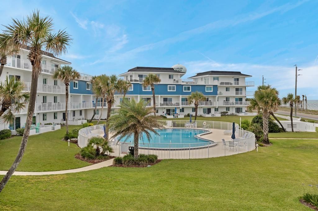 Photo of 3510 S Ocean Shore Boulevard #203, Flagler Beach, FL 32136 (MLS # O6407138)