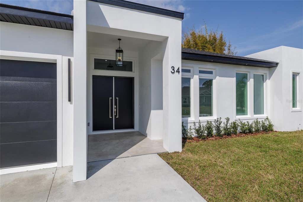 Photo of 34 Fallen Oak Lane, Palm Coast, FL 32137 (MLS # FC320738)