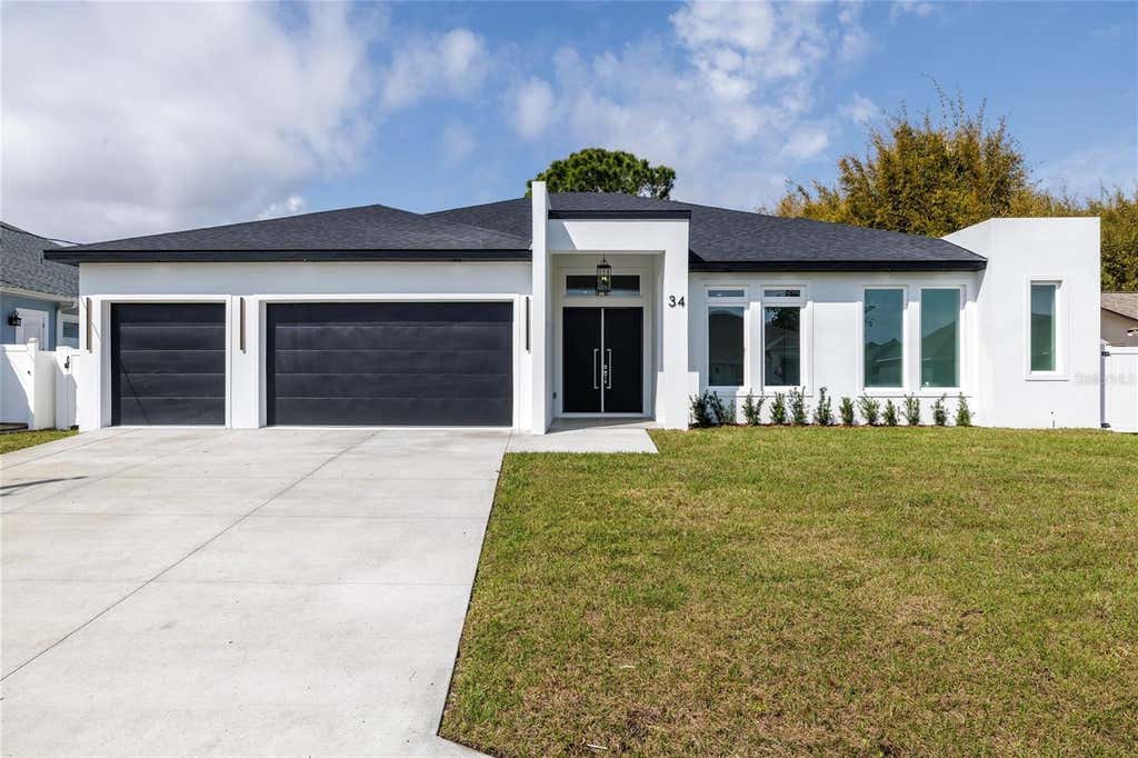 Photo of 34 Fallen Oak Lane, Palm Coast, FL 32137 (MLS # FC320738)