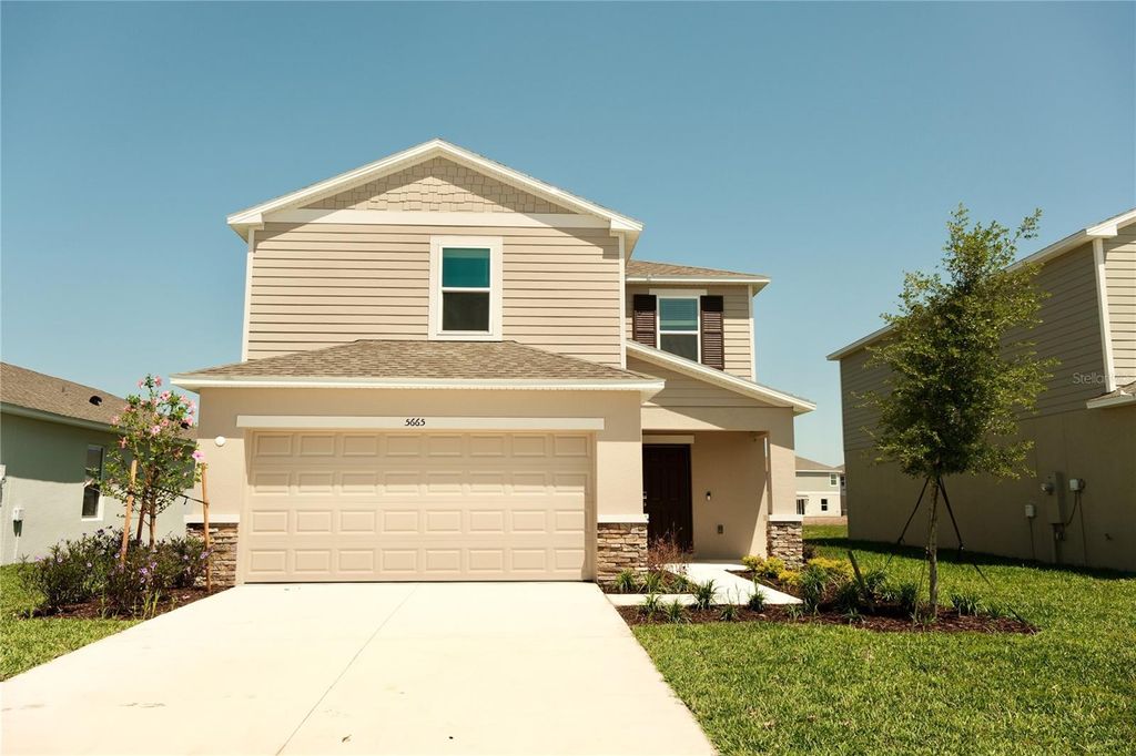 Photo of 5665 Nispero Way, Kissimmee, FL 34758 (MLS # O6406325)