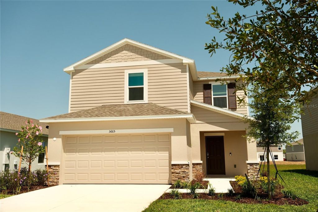 Photo of 5665 Nispero Way, Kissimmee, FL 34758 (MLS # O6406325)