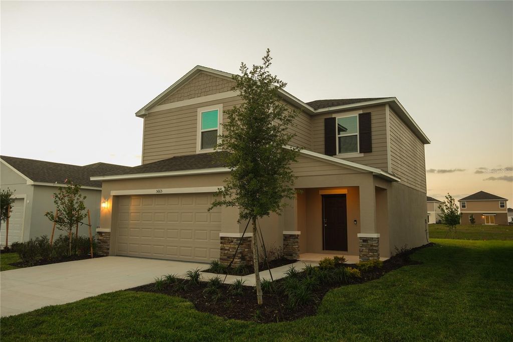 Photo of 5665 Nispero Way, Kissimmee, FL 34758 (MLS # O6406325)