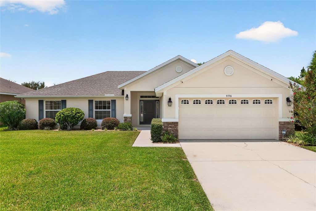 Photo of 9796 Pepper Tree Trail, Wildwood, FL 34785 (MLS # W7888661)
