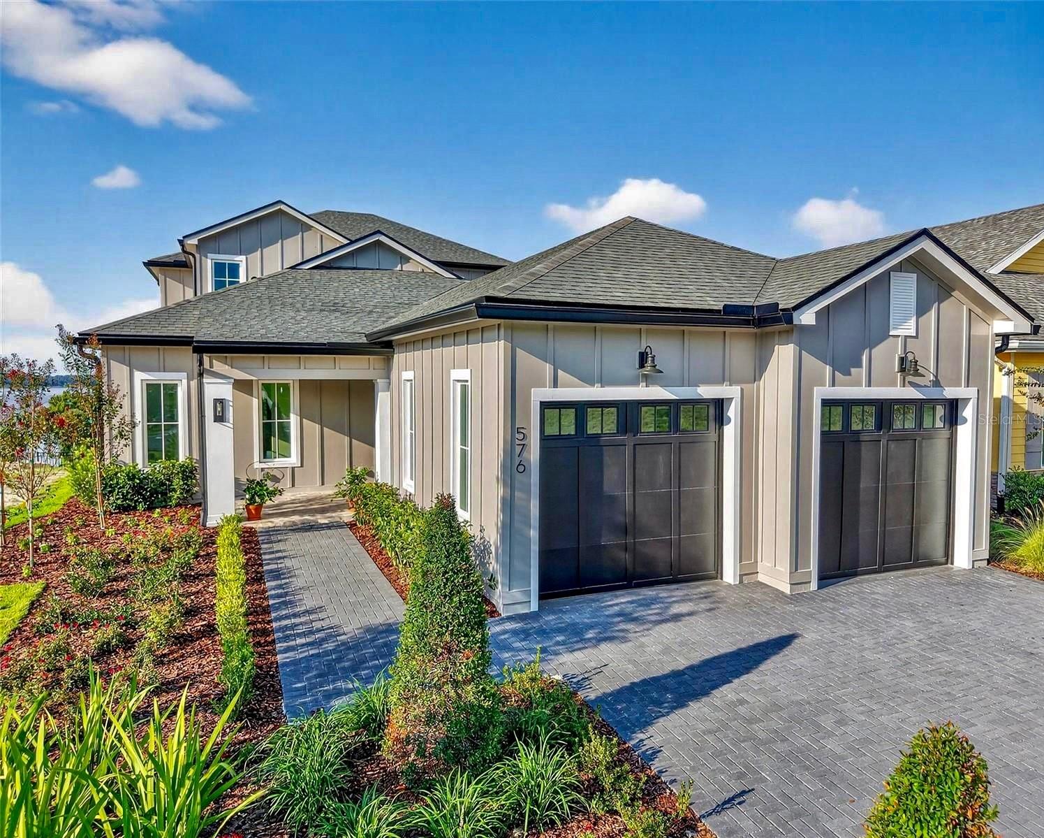 Welcome to The Kalorama, located in Mount Dora's LAST EVER downtown custom home community. The Kalorama is presented by The Dave Cahill Company, known for decades as one of Central Florida's premier custom builders. It combines a stunning Farmhouse style exterior with a spacious, modern interior. Luxury features abound throughout. High ceilings, elegant millwork, upscale cabinetry, appliances and finishes are all here. Enjoy Florida outdoor living in the expansive lanai with a never ending view of gorgeous Lake Dora. The impeccable design also allows that breathtaking view to be enjoyed from the Master Suite, Great Room, Loft & Master Suite ll, on the second floor. Cottages on 11th is situated just a short stroll from the center of the City's quaint collection of shops and eateries. Living here will provide only twenty-seven extremely fortunate and discerning homeowners with the rare combination of luxurious living environment, small town charm and walkable lifestyle. In addition, they’ll enjoy the financial security of being surrounded by like value homes, created in perfect harmony with Mount Dora's renown Historic District.