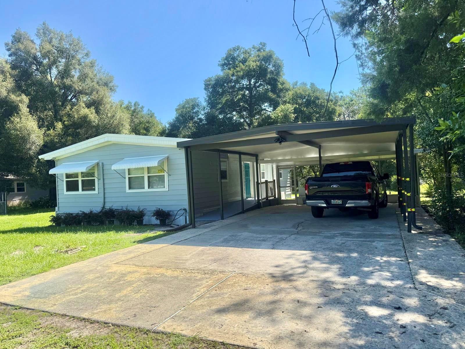 LOCATION! Spacious and beautifully remodeled 2-bedroom, 2-bath mobile home available for lease! This home features an open-concept layout with luxury vinyl flooring, updated tile in the bathrooms, and elegant quartz countertops in both the kitchen and bathrooms. Enjoy relaxing evenings or weekend barbecues on the private deck. The oversized lot provides extra outdoor space and includes convenient storage.
Located near top-rated schools, this home is ideal for families. Just minutes from convenience stores and the popular Cross Florida Greenway Trail System — perfect for walking, biking, or horseback riding.
Prime location, move-in ready, and priced to lease quickly — don’t miss out! Call today before it’s gone.